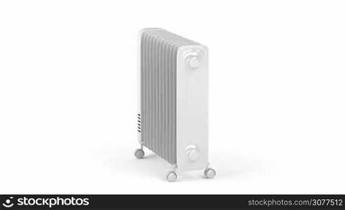 Electric oil-filled heater spins on white background