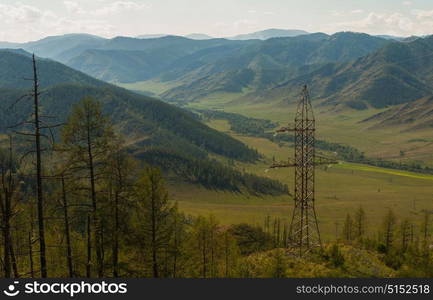 Electric pillar in the mountain. Electric pillar in the mountain, sunny day