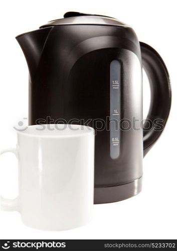 electric tea kettle on a white background and a mug