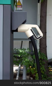 Electric vehicle charging (Ev) station with plug of power cable supply for Ev car