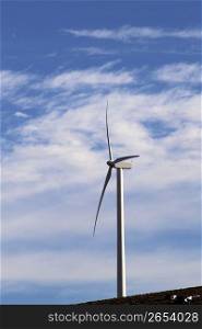 electric windmill aerogenerator blue sky daytime