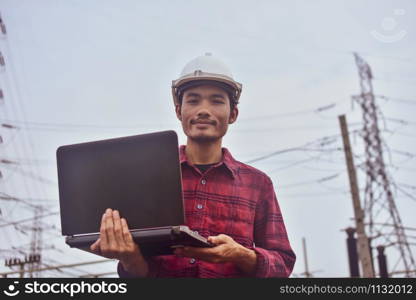 Electrical Engineering holding computer notebook inspection work power plant system background Technology