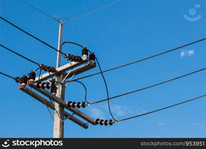 Electrical pole and the sky with the sunlight in the summer.