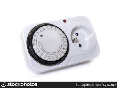 Electrical socket timer in front of white background