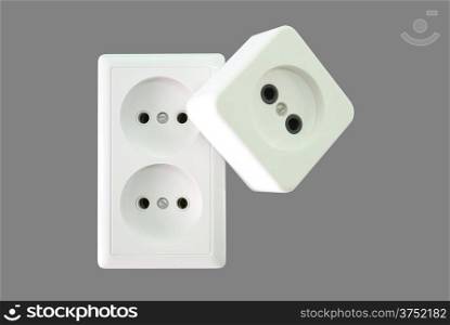 Electrical sockets on a grey background