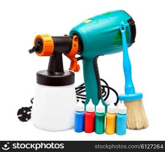 electrical spray gun for coloration, for color pulverization and a paintbrush and small bottles with color