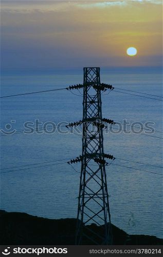 Electrical wire and sunset on the sea