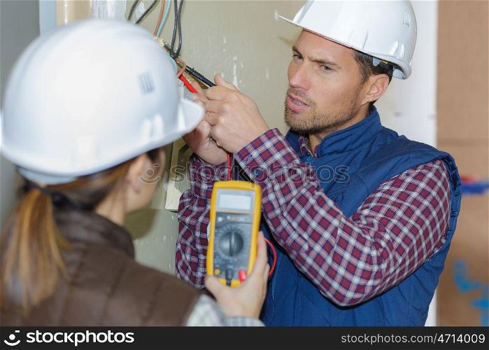 electrician and his assistant