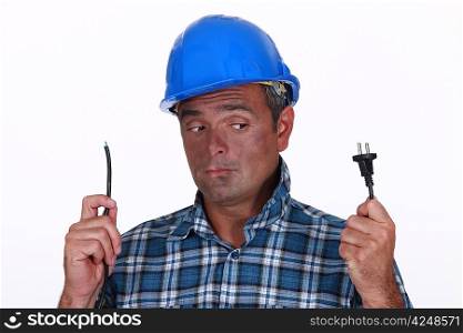electrician holding a cable