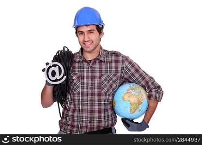 Electrician holding at sign and globe