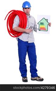 Electrician holding energy rating placard