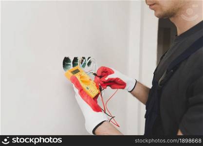 electrician measuring voltage 2. Resolution and high quality beautiful photo. electrician measuring voltage 2. High quality beautiful photo concept