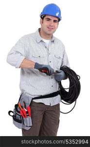 Electrician preparing cable