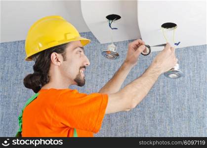 Electrician repairman working on refurbishment
