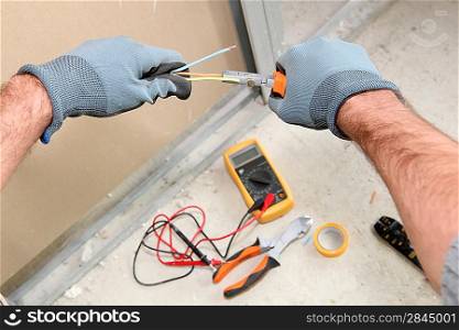Electrician taking a reading with a voltmeter