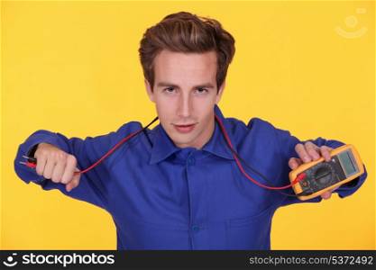 Electrician taking electrical reading