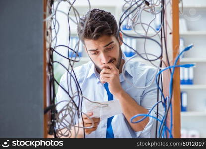 Electrician trying to untangle wires in repair concept