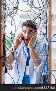 Electrician trying to untangle wires in repair concept