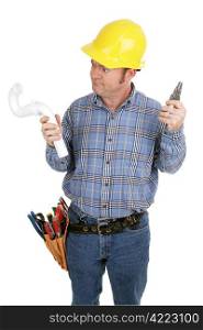 Electrician trying to use the wrong tools on a plumbing job. Isolated on white.