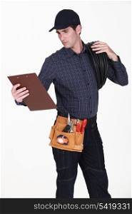 Electrician with a clipboard