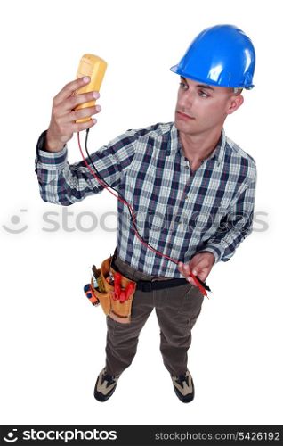 Electrician with multimeter