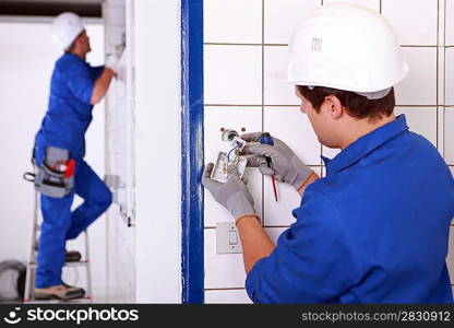 Electricians at work