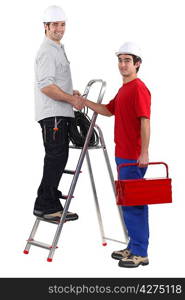 Electricians shaking hands