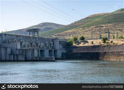 Electricity hydropower generation at the Barragem do Pocinho dam on the Douro river in Portugal. Power generation at the Pocinho dam on the River Douro in Portugal