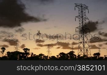 Electricity pillars, sunrise timelapse