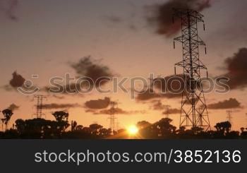 Electricity pillars, timelapse sunrise