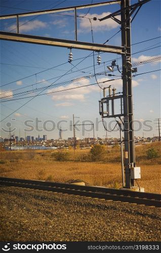 Electricity pylon at a railroad track