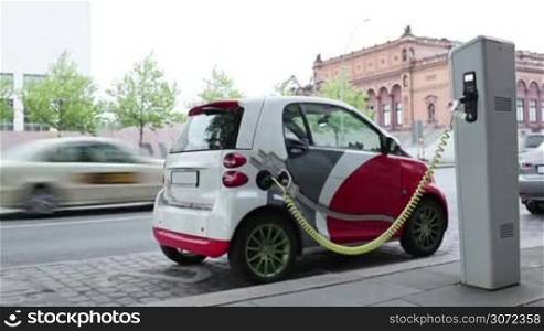 Electro car is charging in the street on May, 30, 2012 in Hamburg, Germany