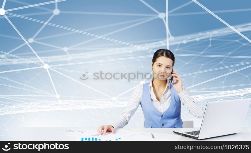 Electronic business and networking. Businesswoman at table working on laptop presenting social connection concept