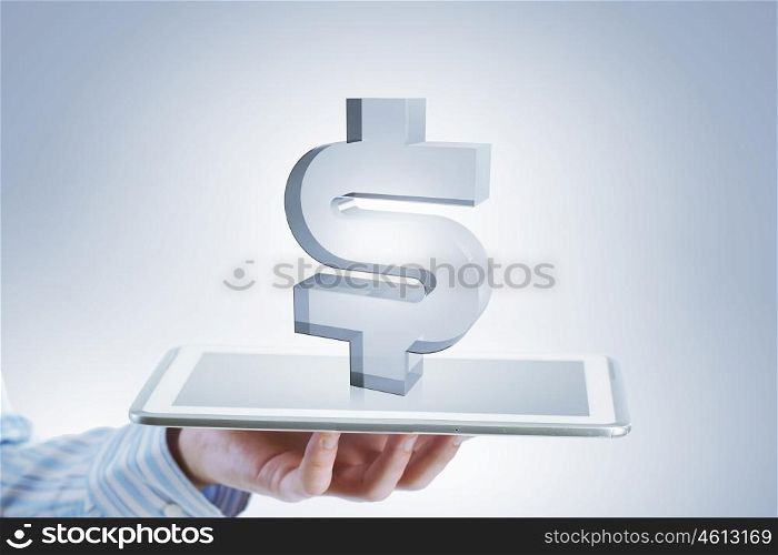 Electronic business concept. Tablet in hand with dollar currency symbols
