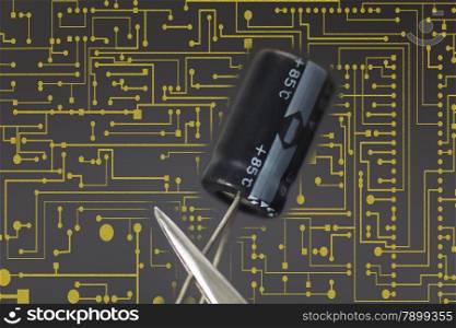 Electronic capacitor in black background