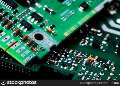Electronic circuit board. Semiconductor motherboard circuit board technology. Mainboard of computer. Integrated semiconductor microchip on green circuit board. Hi-tech industry and computer science.