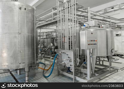 electronic control panel and tank at a milk factory. equipment at the dairy plant. equipment at the milk factory