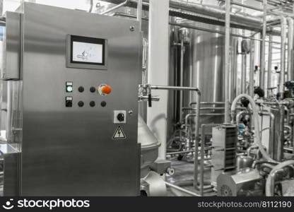 electronic control panel and tank at a milk factory. equipment at the dairy plant. equipment at the milk factory