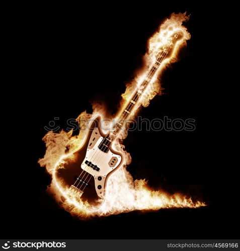 Electronic guitar enveloped flames on a black background