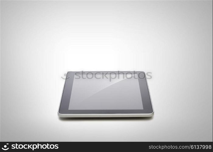 electronics, technology, advertisement and modern gadget concept - black tablet pc computer with blank screen over gray background