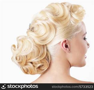 Elegance. Rear View of Blonde with Festive Hairstyle
