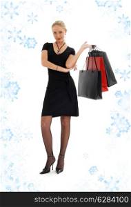 elegant blond with shopping bags and snowflakes