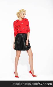 Elegant Blonde in Black Frilly Skirt and Red Blouse