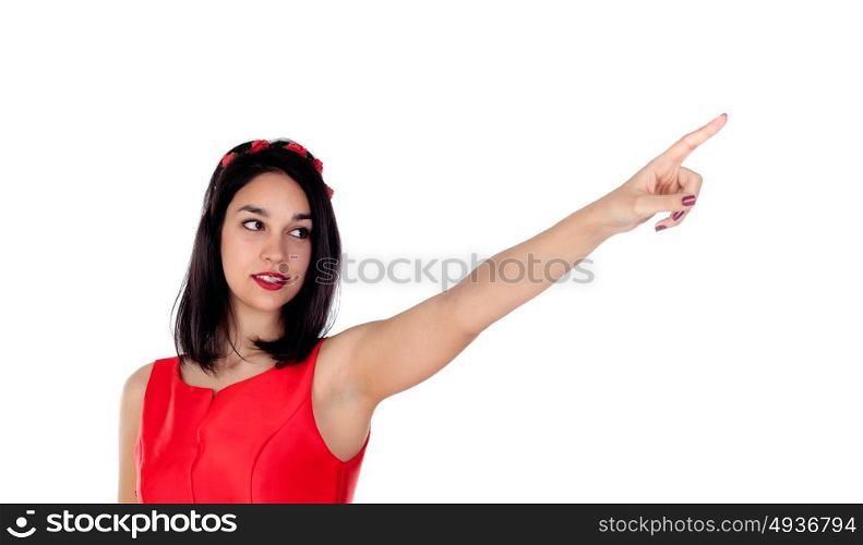 Elegant brunette girl indicating something with her finger isolated on a white background