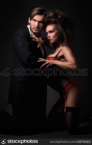 Elegant businessman with his beautiful, sensual lover
