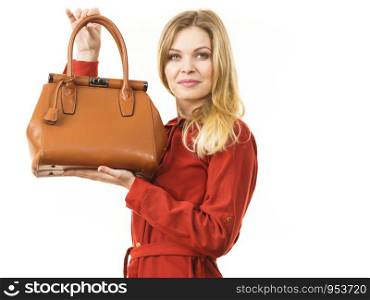 Elegant fashionable young woman with brown leather handbag, on white. Fashion woman with leather handbag