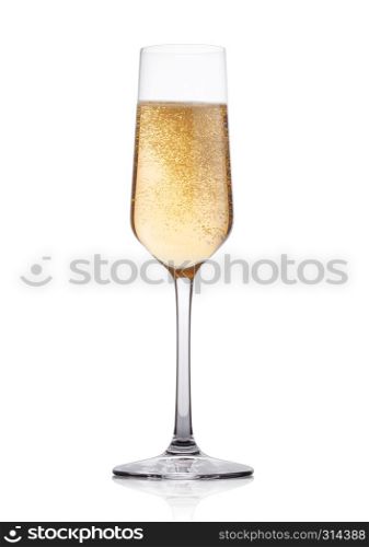 Elegant glass of yellow champagne with bubbles on white background with reflection