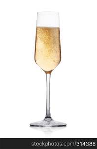 Elegant glass of yellow champagne with bubbles on white background with reflection