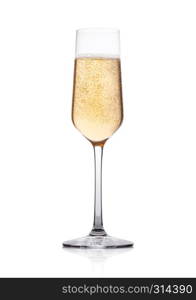 Elegant glass of yellow champagne with bubbles on white background with reflection