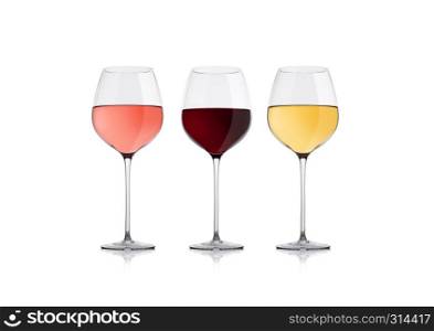 Elegant glasses of white red and pink rose wine on white background